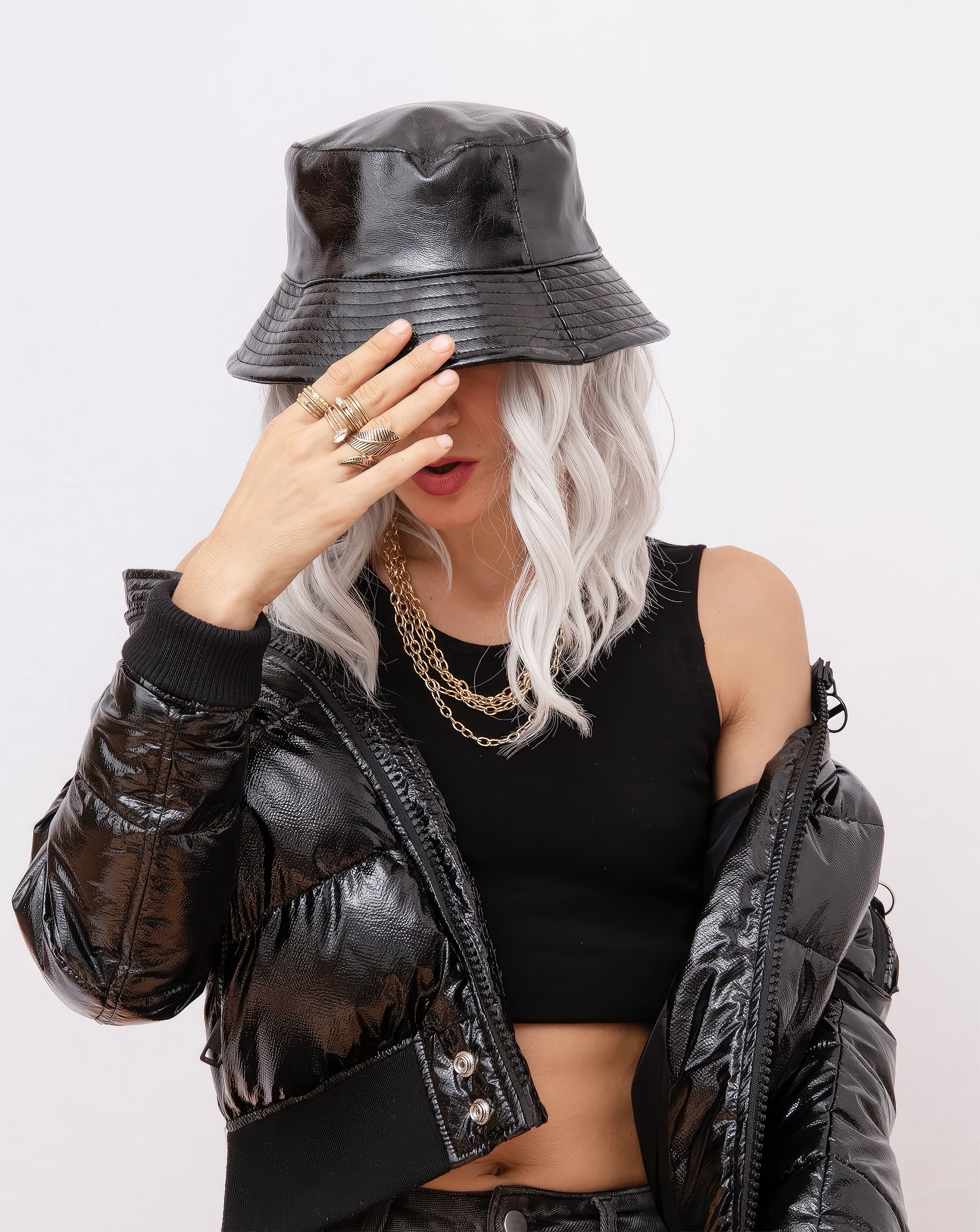 Woman wearing a black fashion bucket hat