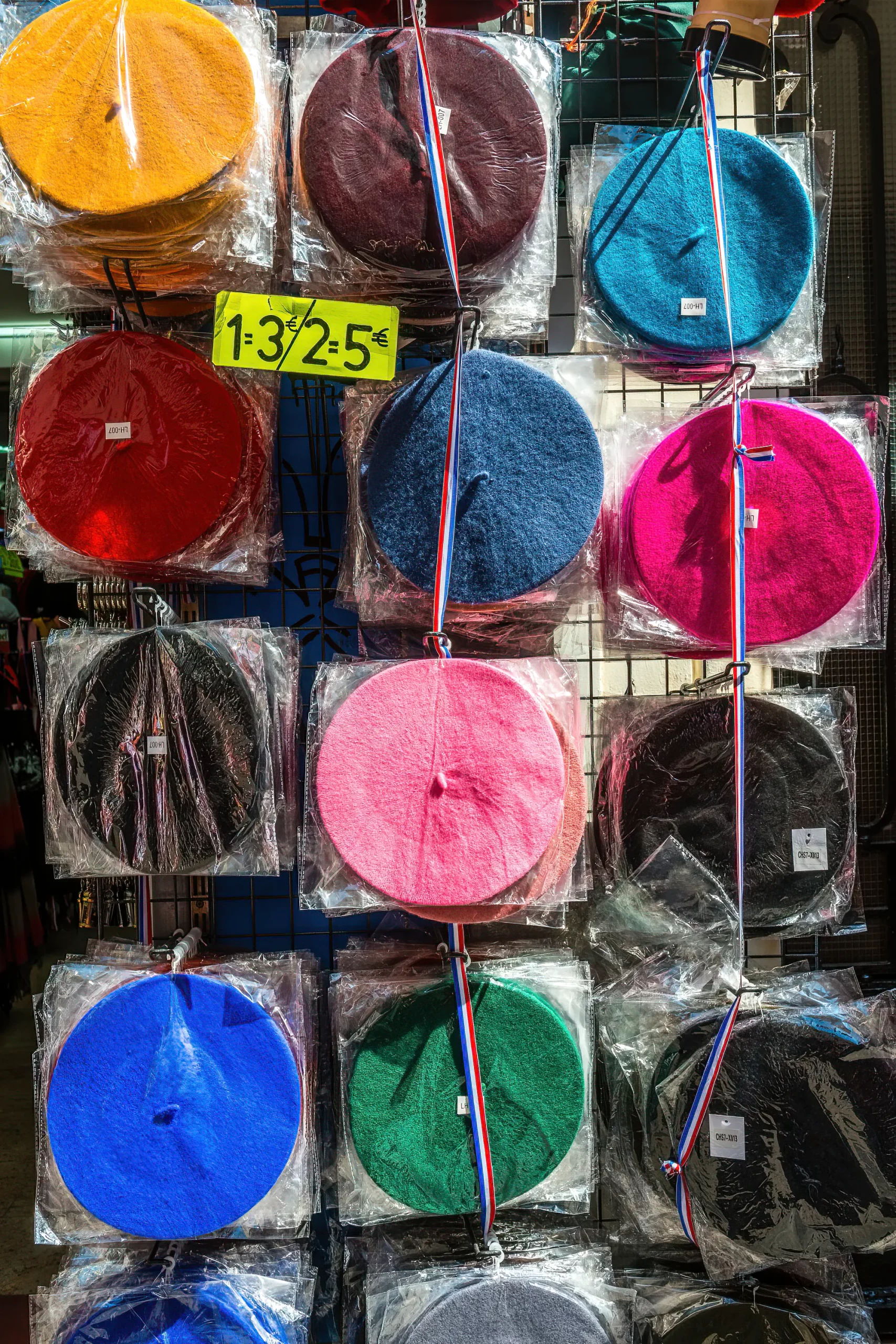 Different colors of beret at the market