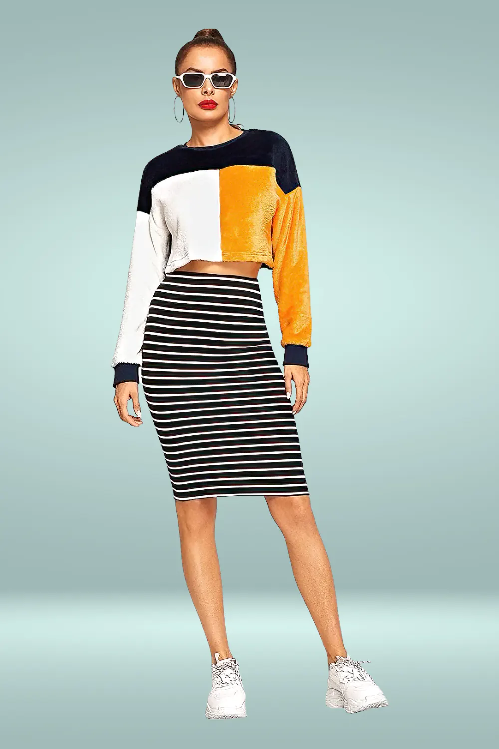 Full shot beautiful woman posing wearing a striped pencil skirt