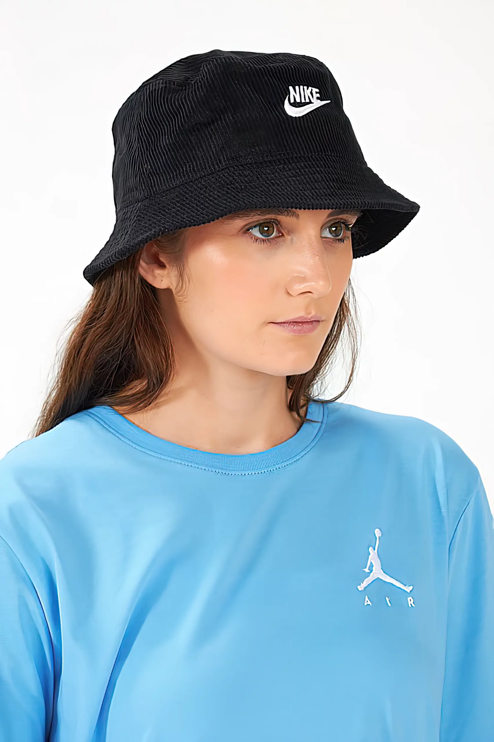 Woman wearing a black sports bucket hat