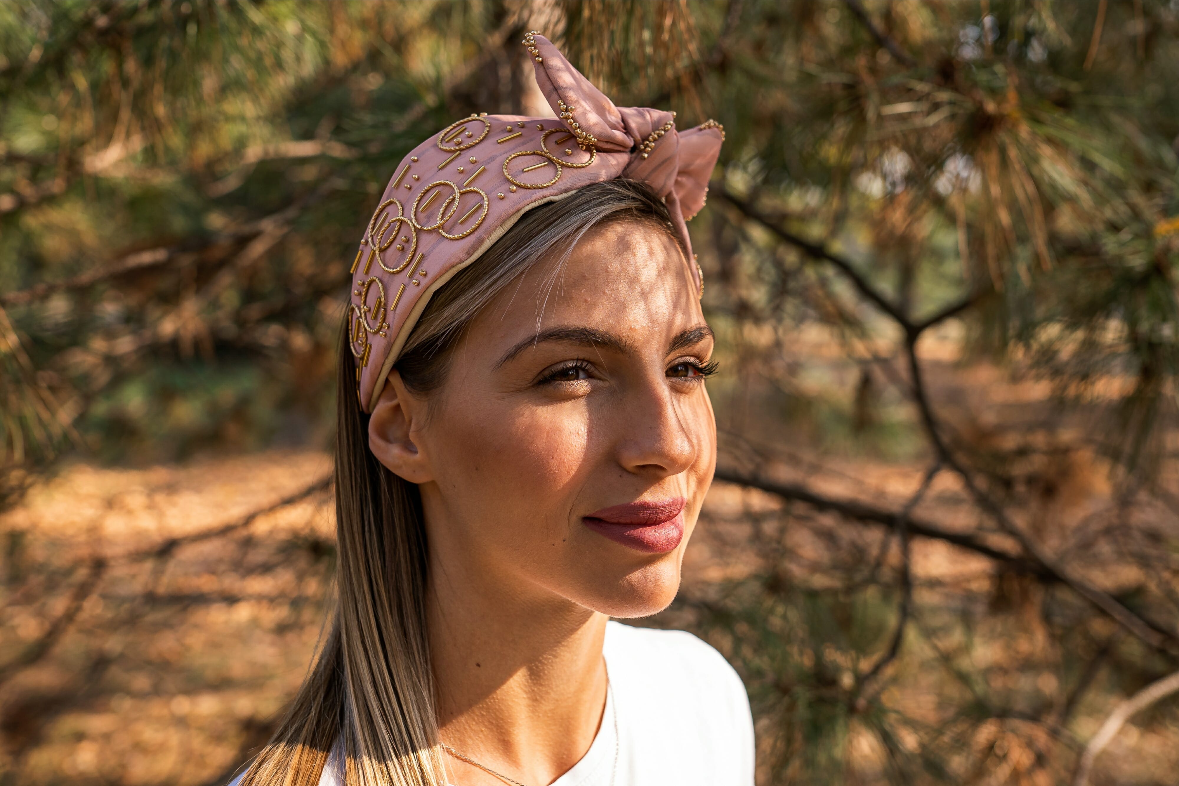 Woman with cute hairband enjoying nature