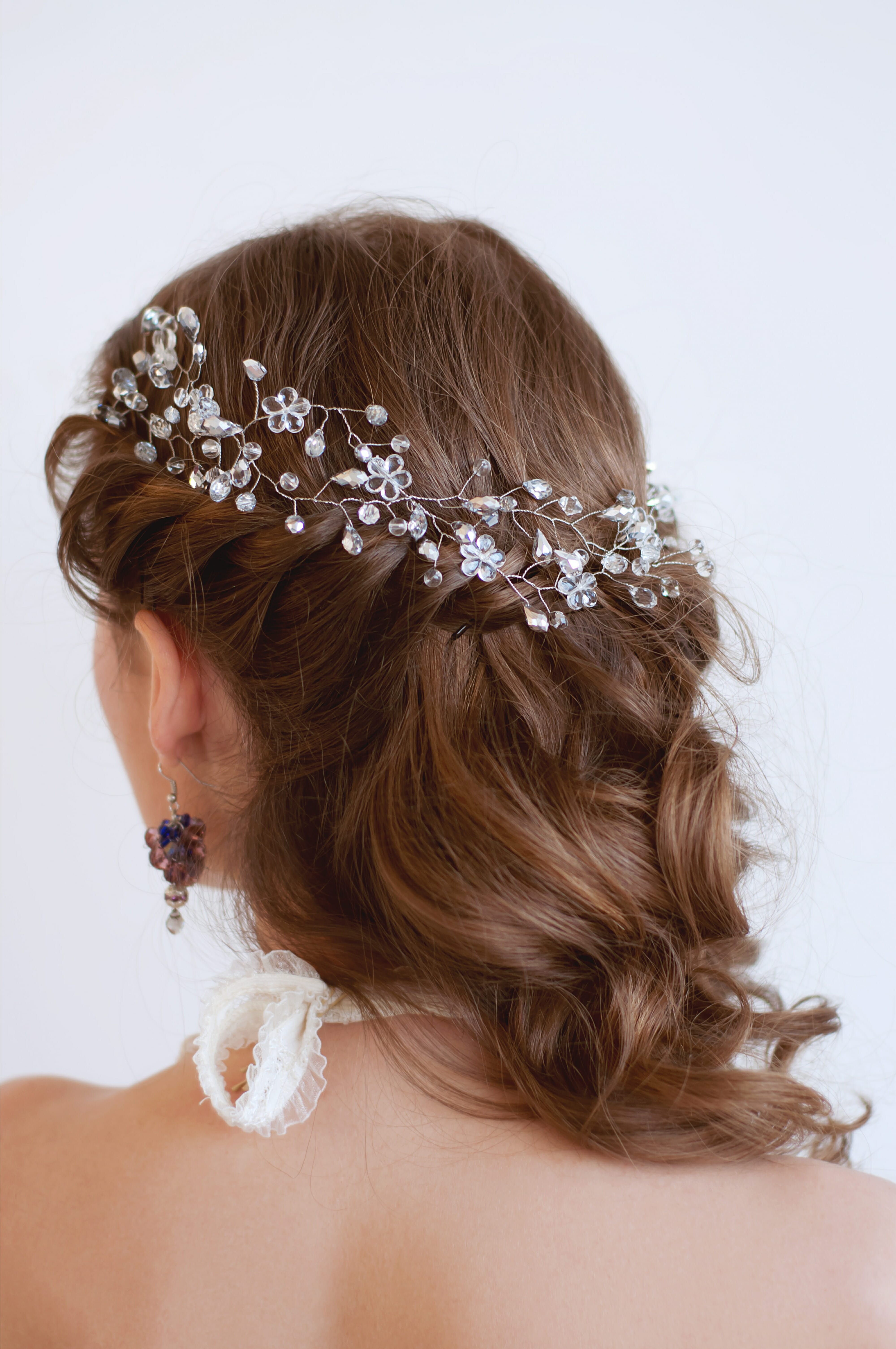 Bridal hairstyle with beaded crystal headpiece